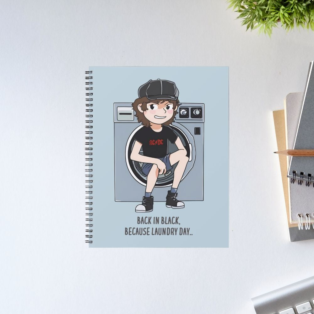 Notebook with a cartoon character sitting on a washing machine on a light blue background Notebook AC/DC The Banyan Tee