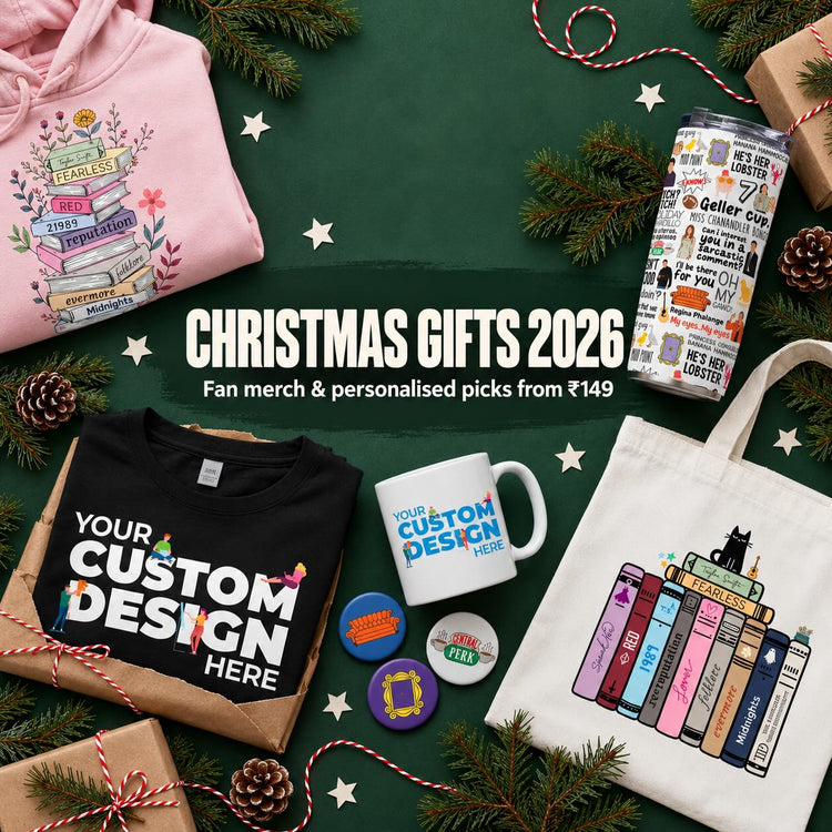 Christmas gifts 2026 flat lay of fan merch and personalised gifts: custom tee, F.R.I.E.N.D.S tumbler, Taylor Swift tote, Stranger Things tee, mug and badges