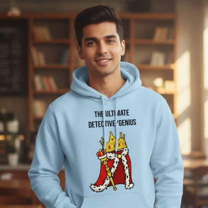 Person wearing a light blue hoodie with a graphic and text in a room with bookshelves. The Ultimate Detective Genius Hoodie. Brooklyn Nine Nine. The Banyan Tee.