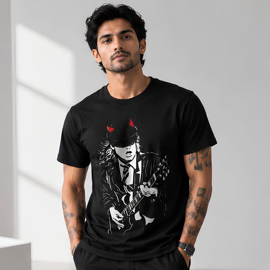 Man wearing a black t-shirt with a graphic design of a person playing guitar, standing against a light gray background. AC/DC t-shirt The Banyan Tee India