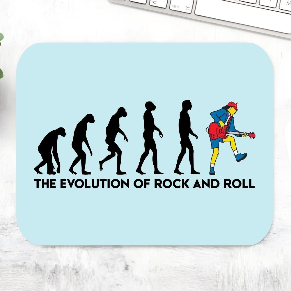 Mouse pad with 'The Evolution of Rock and Roll' design on a light blue background Mousepad AC/DC The Banyan Tee