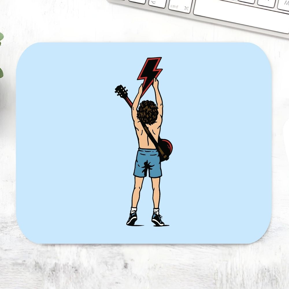 Mouse pad with a graphic of a person holding a guitar on a light blue background Mousepad AC/DC The Banyan Tee