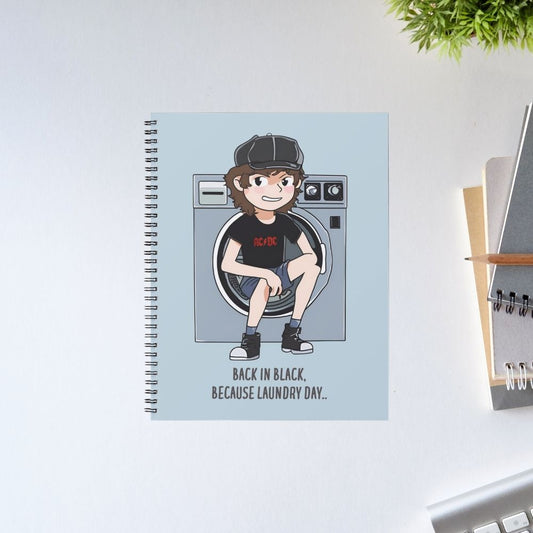 Notebook with a cartoon character sitting on a washing machine on a light blue background Notebook AC/DC The Banyan Tee