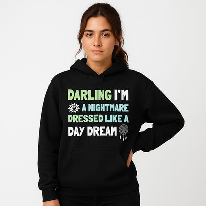 Person wearing a black Taylor Swift Blank Space hoodie with colorful text design on a white background