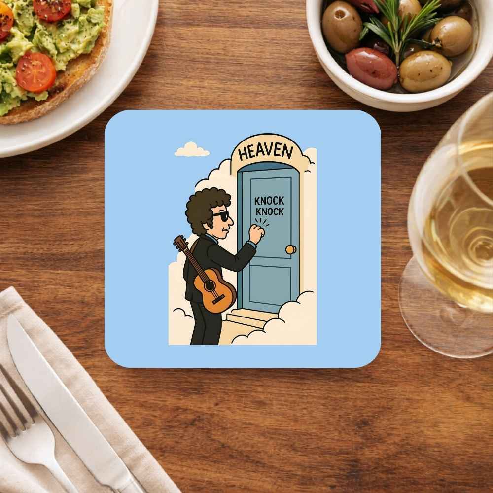 Coaster with a cartoon design of a person with a guitar knocking on a door labeled 'Heaven' on a wooden table with food and drink.  Bob Dylan 