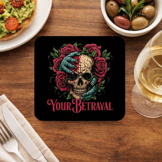 Coaster with skull and roses design on a wooden table with food and drink. Bullet for my valentine.