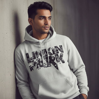 Man wearing a hoodie with 'Linkin Park' design leaning against a wall.