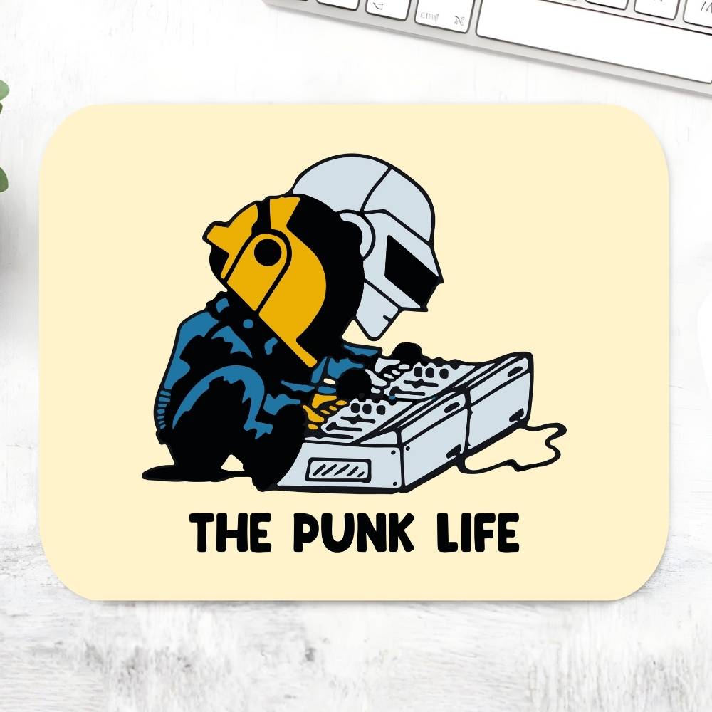 Mouse pad with a design of a robot and a person with headphones, labeled 'The Punk Life', on a light background. Daft Punk The Banyan Tee