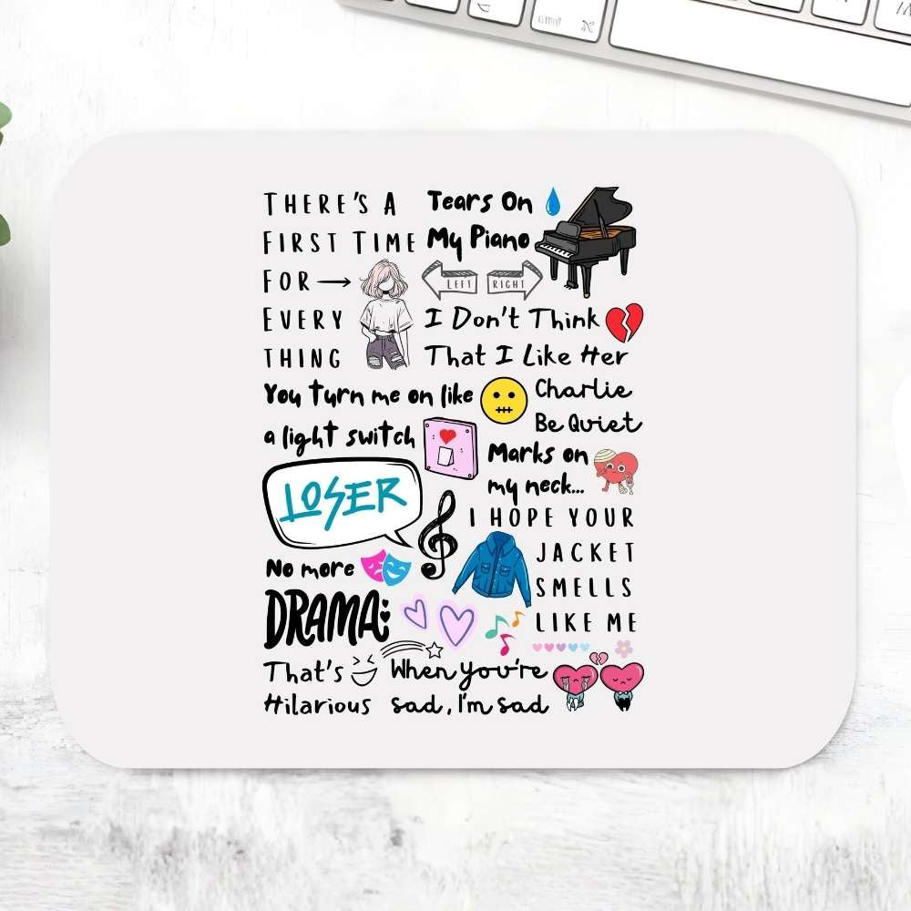 Charlie's Chart Toppers Mousepad – White large desk mat covered in illustrated Charlie Puth song lyrics and doodle art including Attention Loser We Don't Talk Anymore, pop music fan gift, The Banyan Tee