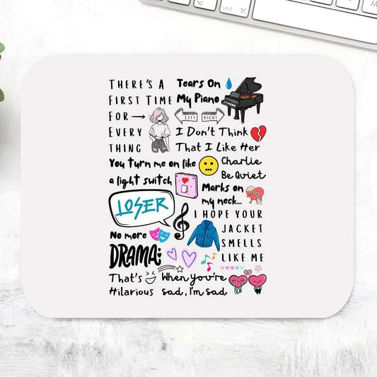 Charlie's Chart Toppers Mousepad – White large desk mat covered in illustrated Charlie Puth song lyrics and doodle art including Attention Loser We Don't Talk Anymore, pop music fan gift, The Banyan Tee