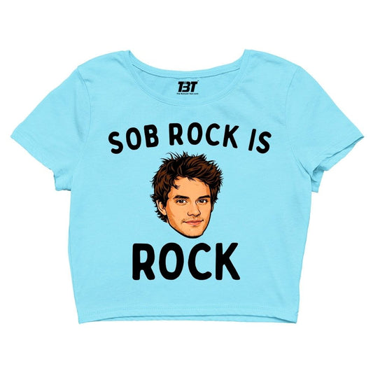 Light blue crop top with graphic and text 'SOB ROCK IS ROCK' on a white background John Mayer Concert merch crop top