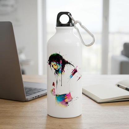 Moonwalker metal sipper bottle on an office desk beside a laptop and notebook