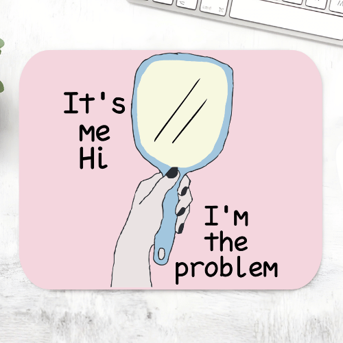 Taylor Swift Anti-Hero mousepad with a hand holding a mirror and the lyric 'It's me, hi, I'm the problem' on a pink mouse pad – non-slip desk mouse mat, The Banyan Tee