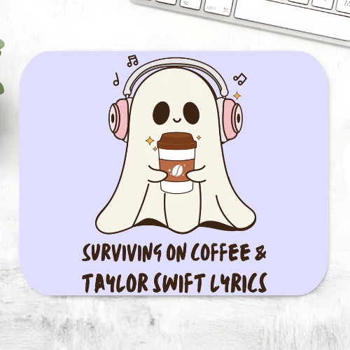 Taylor Swift Coffee and Tay's Lyrics mousepad with a cute ghost in headphones holding a coffee cup and the line 'Surviving on coffee & Taylor Swift lyrics' on a periwinkle mouse pad – non-slip desk mouse mat, The Banyan Tee