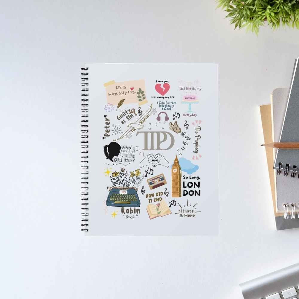 Taylor Swift A Poet's Doodle spiral notebook covered in Tortured Poets Department doodles – typewriter, Big Ben, cassette tape and TTPD logo – on a white cover – unruled notepad diary, The Banyan Tee