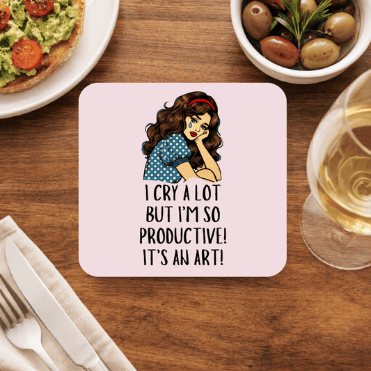 Taylor Swift coaster with a teary retro pop-art girl in a polka-dot dress and the line I cry a lot but I'm so productive, it's an art