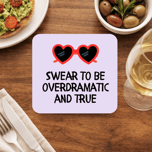 Taylor Swift Overdramatic and True coaster with red heart-shaped sunglasses and the words Swear to be overdramatic and true, on lilac