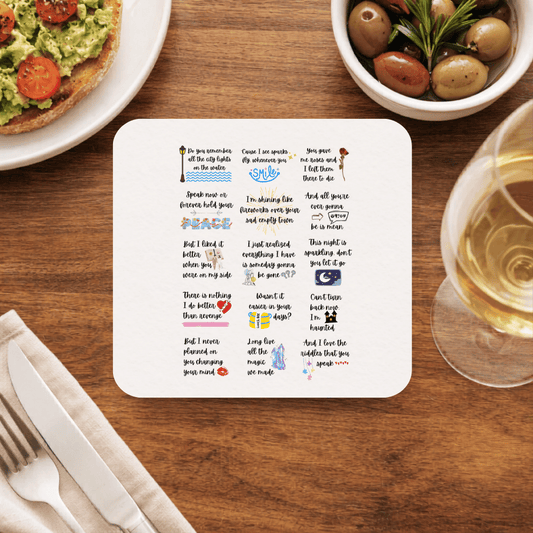 Taylor Swift Tale of Tunes coaster with a grid of fifteen handwritten lyrics, each paired with a tiny doodle, from a lamp post to a moon and a castle, on cream